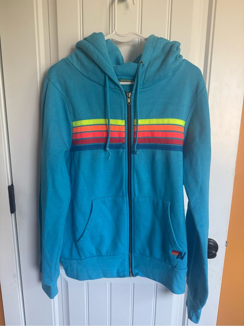 Avaitor Nation Blue Zip-Up Hoodie with Rainbow Stripes- Med